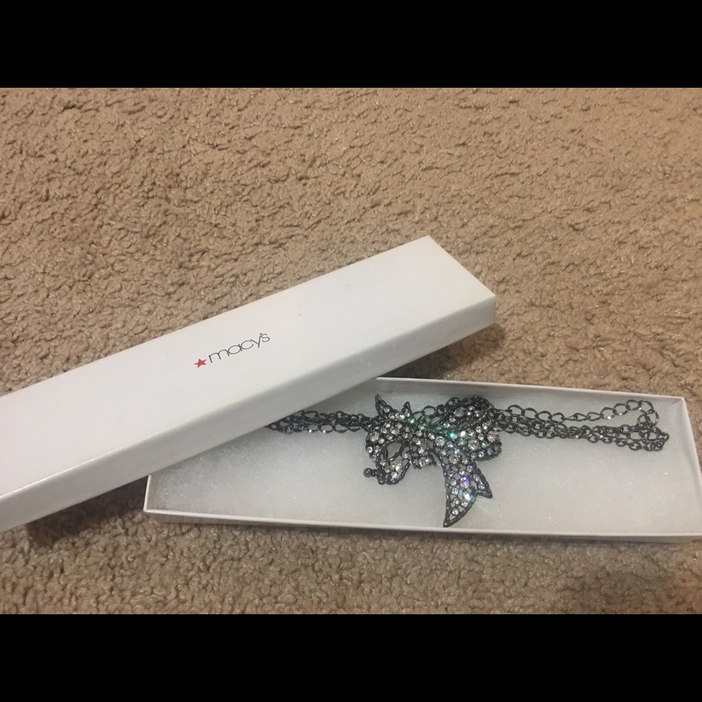 Macy’s gun metal bow necklace
